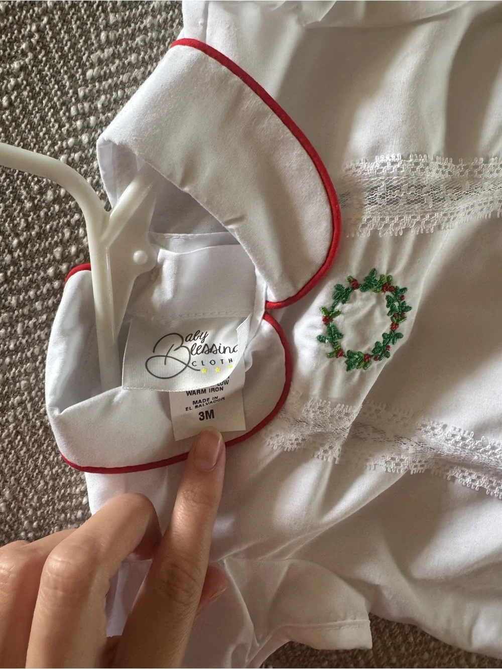 White Baby One-Piece with Red Trim and Green Wreath Embroidery